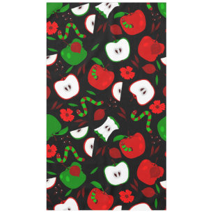 rotten red apples green worms black floral tablecloth