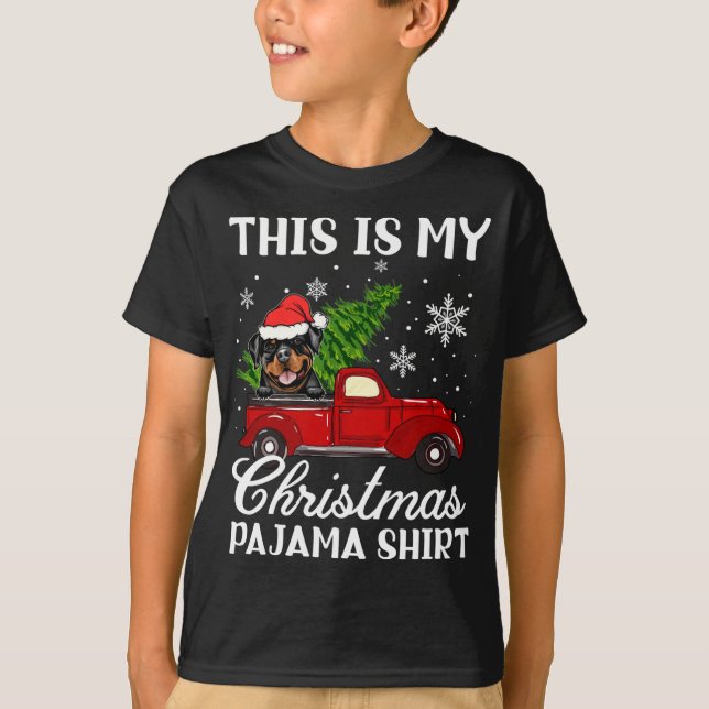 Rottweiler Dog Riding Red Truck With Christmas Tre T-Shirt (Front)