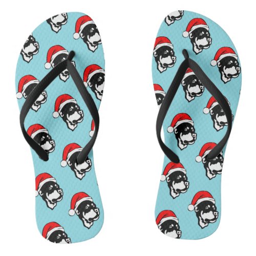 Rottweiler Dog wearing Red Christmas Santa Hat Flip Flops