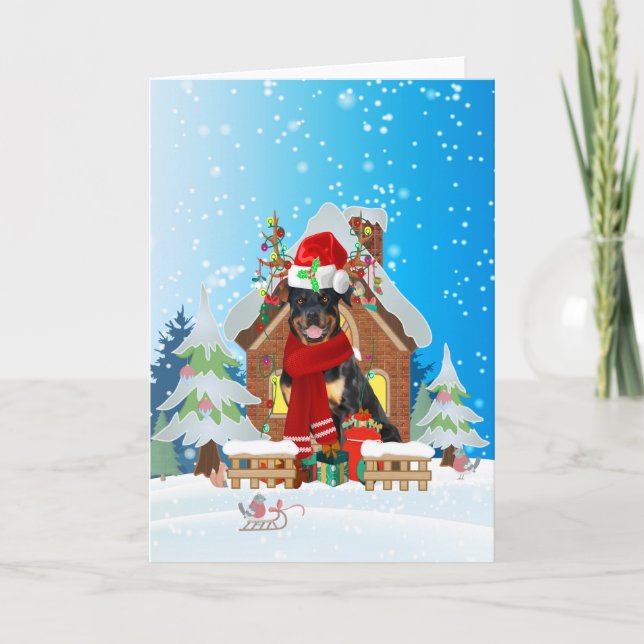 Rottweiler in snow with Christmas gifts  Card (Front)