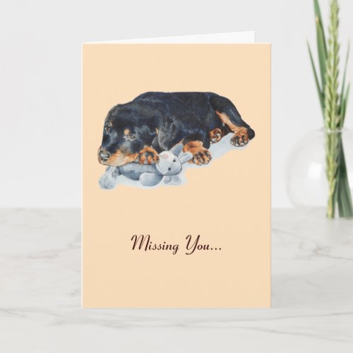 rottweiler puppy dog cuddling teddy missing you card