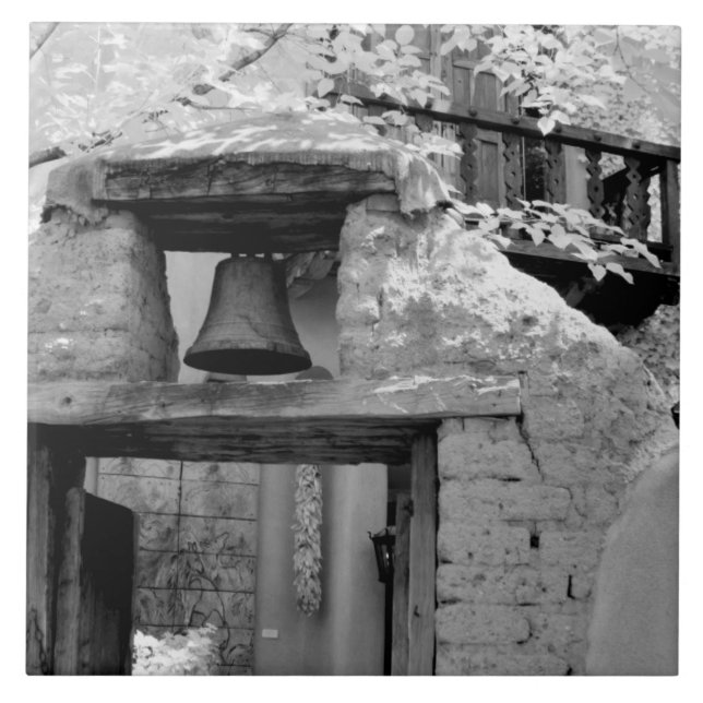 Rough adobe bell in entryway, Santa Fe, New Ceramic Tile (Front)