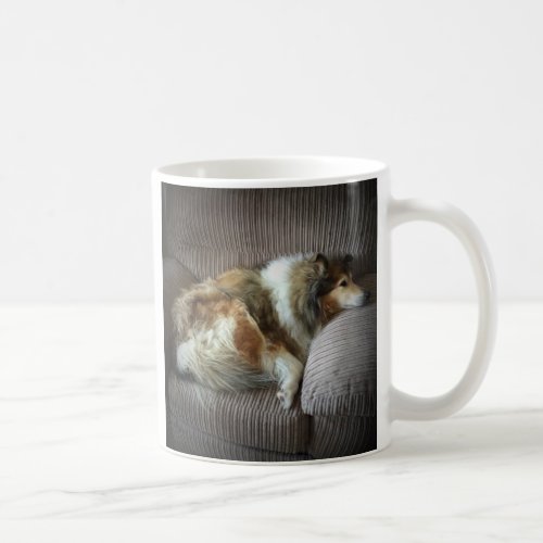 Rough collie on armchair coffee mug