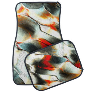 Rough silvery rock over burning ember, intensity car floor mat