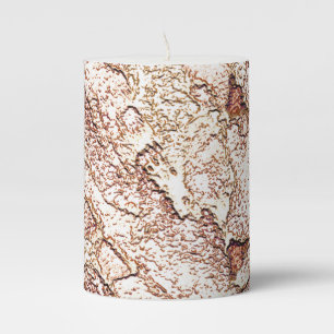 Rough stone in creamy light brown pillar candle