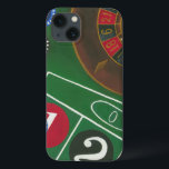 Roulette Table with Chips and Wheel iPhone 13 Case<br><div class="desc">The spinning wheel holds all the power on the roulette table, but the power of this painting is in the lifelike depiction of a casino scene. The green of the felt and the color of the chips puts you at the table, waiting on your bet to pay off. Be sure...</div>