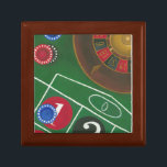 Roulette Table with Chips and Wheel Gift Box<br><div class="desc">The spinning wheel holds all the power on the roulette table, but the power of this painting is in the lifelike depiction of a casino scene. The green of the felt and the color of the chips puts you at the table, waiting on your bet to pay off. Be sure...</div>