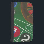 Roulette Table with Chips and Wheel Samsung S4 Wallet Case<br><div class="desc">The spinning wheel holds all the power on the roulette table, but the power of this painting is in the lifelike depiction of a casino scene. The green of the felt and the color of the chips puts you at the table, waiting on your bet to pay off. Be sure...</div>