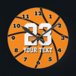 Round basketball clock with custom number and text<br><div class="desc">Round basketball wall clock with custom number and text. Cool sports gift for home,  office or club. Personalizable design.</div>