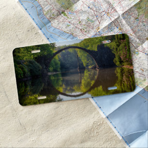 Round Grey Rock Bridge over a River in the Woods License Plate