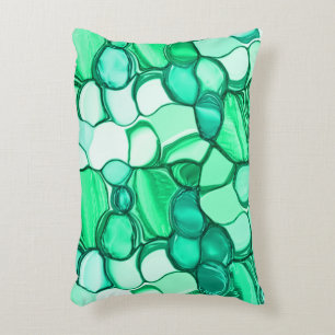 Round like stones in shades of clear green to mint accent pillow