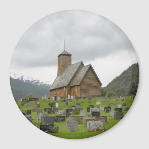 Round magnet stave church with graveyard in Norway