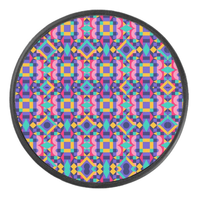 Round object with a vibrant geometric pattern hockey puck (Front)
