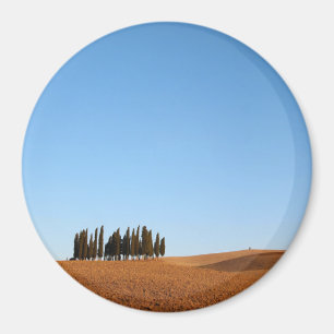 Round Tuscany landscape magnet with cypress trees