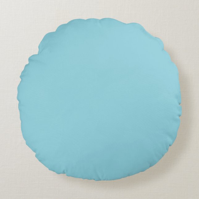 rounded cloud-like shape on light gray round pillow (Front)