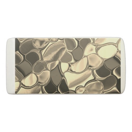 Rounded shapes in bronze color glossy light gold eraser