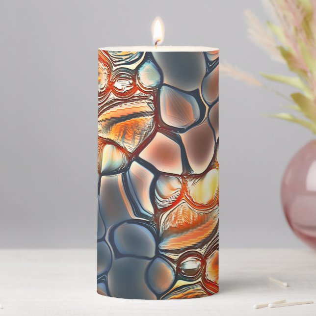Roundish shapes in burnt cyan and ember orange     pillar candle (In Situ)