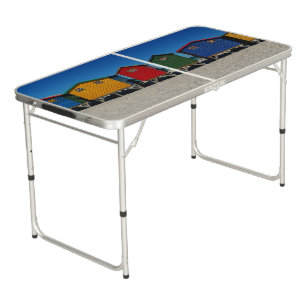 Row of Brightly Colored Beach Huts Beer Pong Table