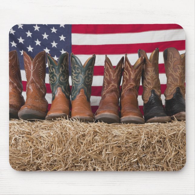 Row of cowboy boots on haystack mouse pad (Front)
