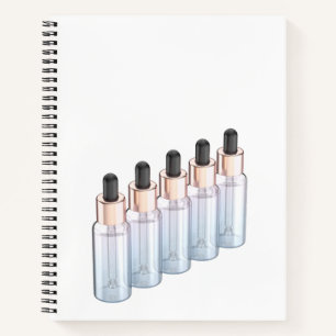 Row of glass dropper bottles notebook