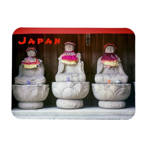 Row of Jizo monk statues with bib and hat _ Japan Magnet