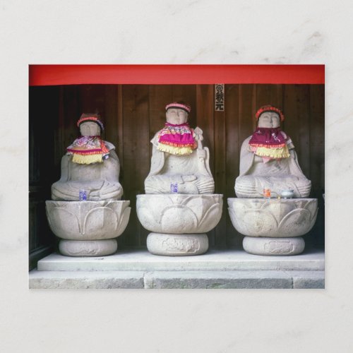 Row of Jizo monk statues with bib and hat _ Japan Postcard