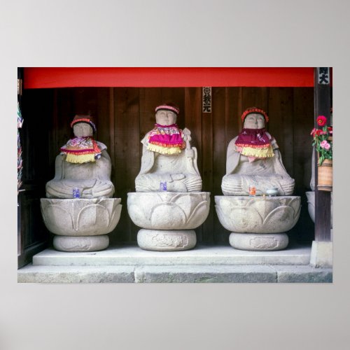 Row of Jizo monk statues with bib and hat _ Japan Poster