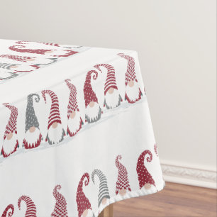 Rows of holiday gnomes in the snow tablecloth