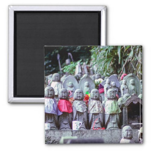 Rows of small Jizo monk statues with bibs _ Japan Magnet