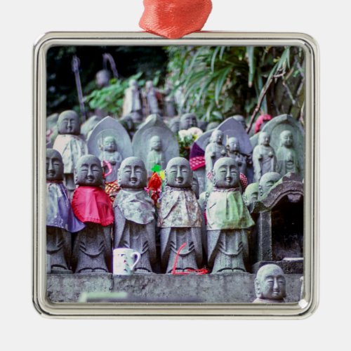 Rows of small Jizo monk statues with bibs _ Japan Metal Ornament