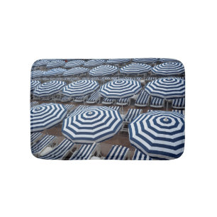 Rows Of Striped Beach Umbrellas With Sun Beds Bathroom Mat