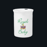 Royal Baby with Purple and Gold Crown Pitcher<br><div class="desc">An adorable,  classy design celebrating the royal birth!  The words Royal Baby in emerald green,  and a classic purple velvet crown with pearls,  rubies,  and emeralds.  Great for your own royal baby!</div>