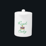 Royal Baby with Purple and Gold Crown Teapot<br><div class="desc">An adorable,  classy design celebrating the royal birth!  The words Royal Baby in emerald green,  and a classic purple velvet crown with pearls,  rubies,  and emeralds.  Great for your own royal baby!</div>