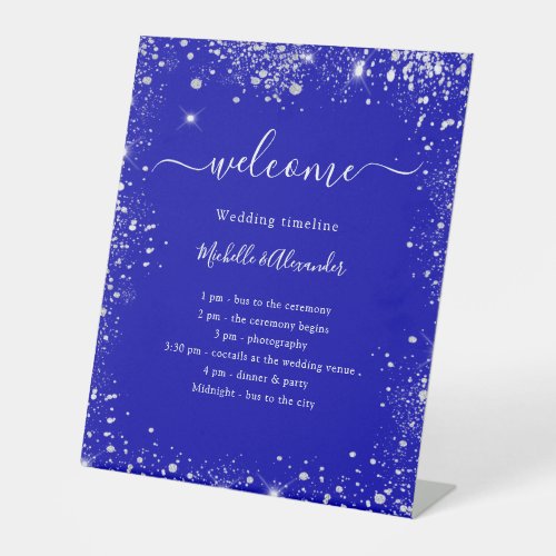 Royal blue silver glitter wedding program timeline pedestal sign