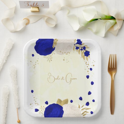 royal blue  white flowers gold paper plates