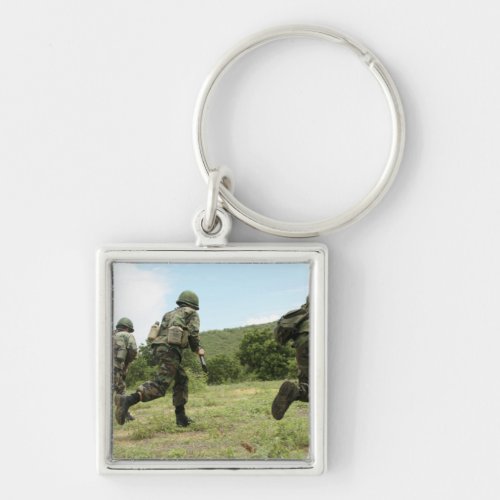 Royal Thai Marines rush forward to secure the s Keychain