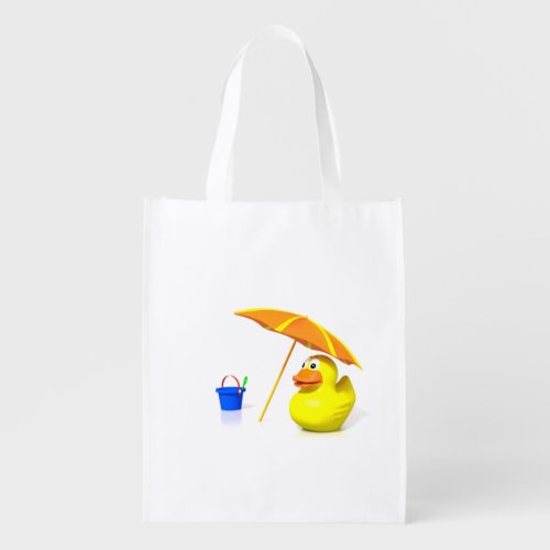 Rubber duck at the beach grocery bag