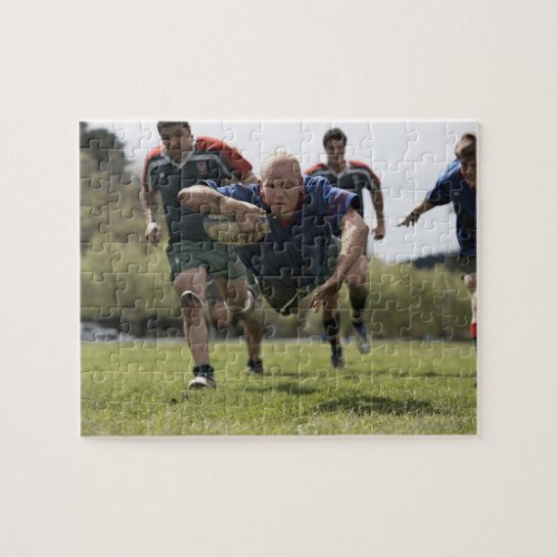 Rugby player scoring jumping on groud with ball jigsaw puzzle