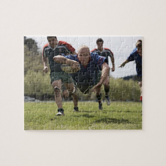 Rugby player scoring jumping on groud with ball jigsaw puzzle (Horizontal)