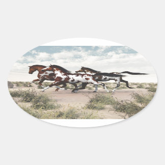 Run Like the Wind - Galloping Paint Horses Oval Sticker