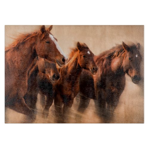 Running horses blur and flying manes cutting board