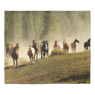 Running horses on Montana ranch Duvet Cover