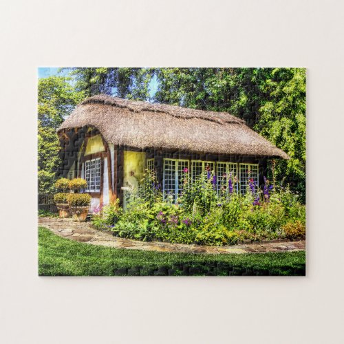 Rural cottage with thatched roof jigsaw puzzle