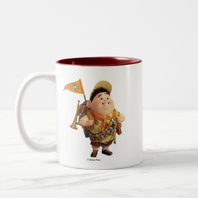 Russell smiling - the Disney Pixar UP Movie Two-Tone Coffee Mug (Left)