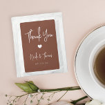 Rust | Personalized Wedding Favor Tea Bag Drink Mix<br><div class="desc">A perfect party favor for your rehearsal dinner,  engagement party,  or wedding,  drink packets feature white handwritten lettering on a terracotta rust background with a small heart illustration in the center. "Thank You" appears at the top,  with your event name and date beneath.</div>