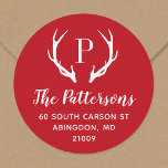 Rustic Antler Monogram Return Address Label<br><div class="desc">Custom round return address stickers personalized with your family monogram and address. This modern rustic design features your monogram initial with deer antlers in festive red and white colors. Use the design tools to change the background color and fonts to further customize your own unique design. Perfect for addressing holiday...</div>