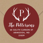 Rustic Antler Monogram Return Address Label<br><div class="desc">Custom round return address stickers personalized with your family monogram and address. This modern rustic design features your monogram initial with deer antlers in burgundy and white colors. Use the design tools to change the background color and fonts to further customize your own unique design. Perfect for addressing holiday cards,...</div>