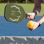Rustic Army Green Antler Custom Groomsmen Gift Pickleball Paddle<br><div class="desc">Celebrate your groomsmen with our sophisticated Pickleball Paddle, the perfect gift for honoring your best man or proposing to your groomsmen. Crafted with a blend of rustic charm and modern elegance, this paddle features an army green background adorned with soft amber/beige antler motifs and personalized monogram initials. Embrace the rugged...</div>