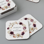 Rustic Autumn Floral Wreath Wedding Square Paper Coaster<br><div class="desc">Elegant fall floral wedding coasters featuring your names encircled by wreath of watercolor flowers and foliage in shades of marsala, burgundy, purple, ivory, cream, brown, and orange. The boho autumn floral wedding coasters are perfect for your wedding reception, rehearsal dinner, engagement party, couples shower, etc. The design coordinates with our...</div>