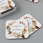 Rustic Autumn Floral Wreath Wedding Square Paper Coaster<br><div class="desc">Elegant fall floral wedding coasters featuring your names encircled by wreath of watercolor flowers and foliage in shades of ivory, cream, brown, and orange. The boho autumn floral wedding coasters are perfect for your wedding reception, rehearsal dinner, engagement party, couples shower, etc. The design coordinates with our Rustic Autumn Floral...</div>